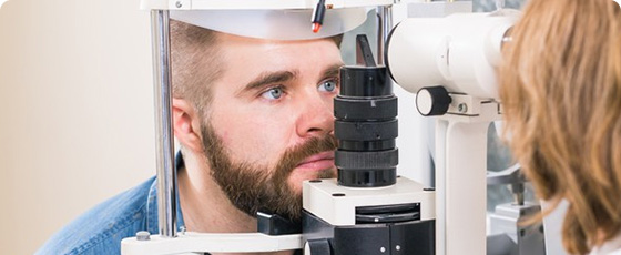 Male patient during a booked eye test